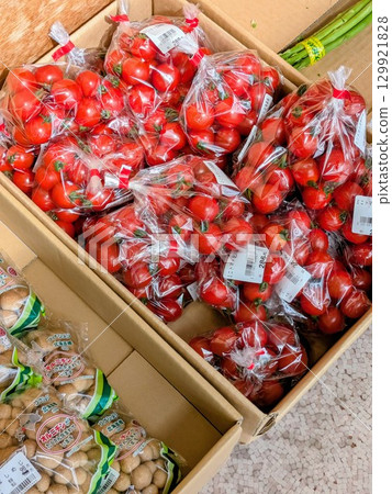 Mini tomatoes sold at supermarkets 129921828