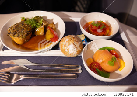 Delicious international business class meals Delicious international business class meals 129923171