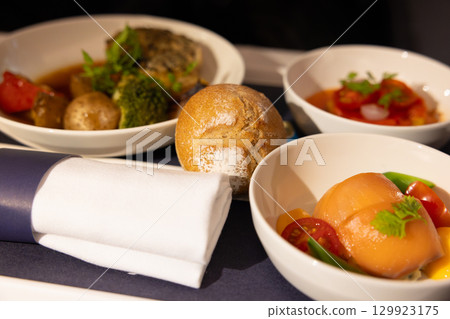 Delicious international business class meals 129923175