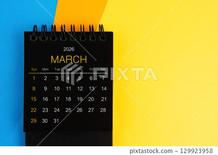 Black mini calendar for March 2026 on multi color background. Black mini calendar for March 2026 on multi color background. 129923958