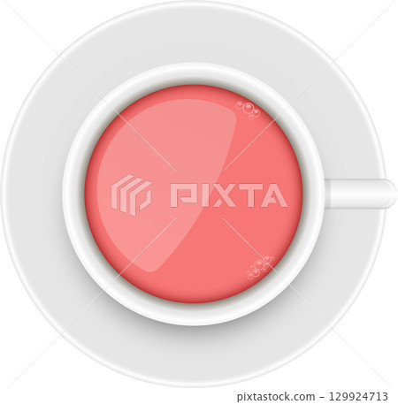 Overhead view of a pink beverage in a white cup on a saucer with small bubbles visible. 129924713