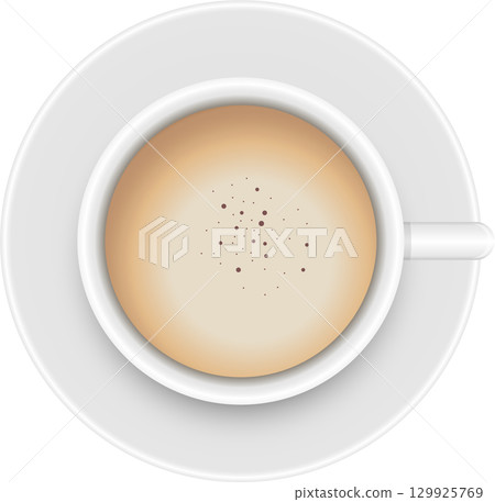 Overhead view of a cup filled with a creamy beverage and topped with light brown speckles. 129925769