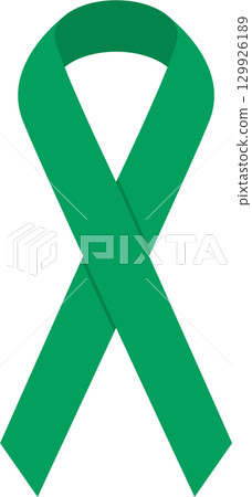 A green awareness ribbon on a black background, symbolizing support and raising awareness. 129926189