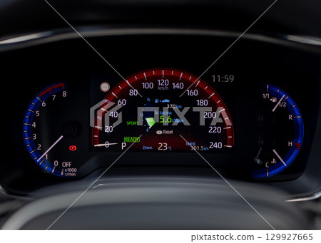 Modern car dashboard with speedometer tachometer and digital display Modern car dashboard with speedometer tachometer and digital display 129927665