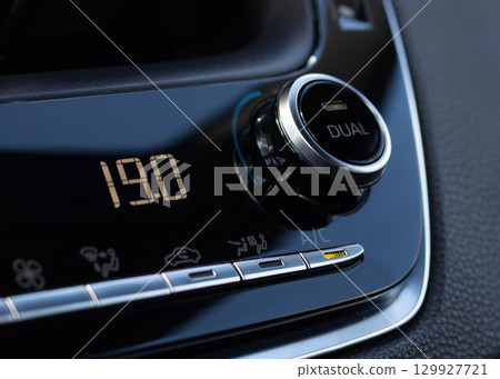 Car climate control panel close-up 129927721