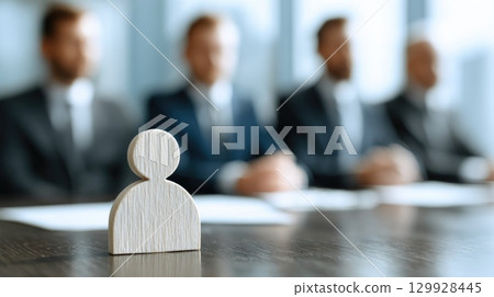 Job Interview Concept with Wooden Figure and Businessmen 129928445