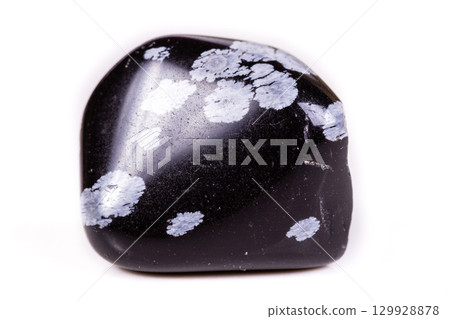 Macro mineral stone snow obsidian on white background 129928878