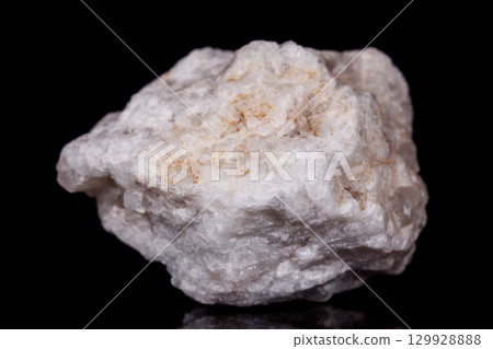 Macro mineral stone Albit on black background 129928888