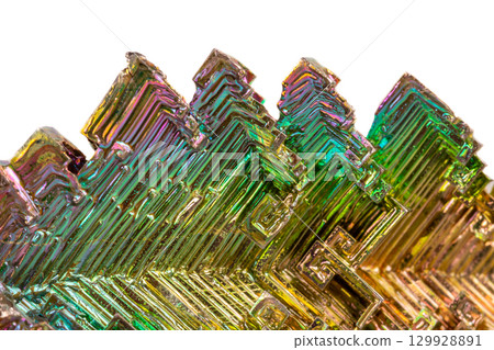 Macro of the mineral bismuth stone on a white background Macro of the mineral bismuth stone on a white background 129928891
