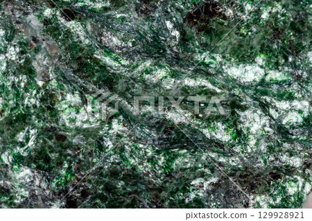Macro mineral stone Fuchsite on a white background 129928921