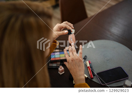 Crafting beauty at home while enjoying a cozy afternoon filled with creativity and self-care 129929023