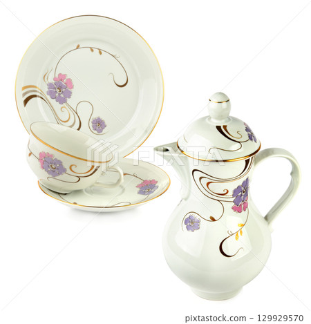 Vintage Teacup and Coffee Pot isolated on white background. Elegant Porcelain Coffee Set. 129929570