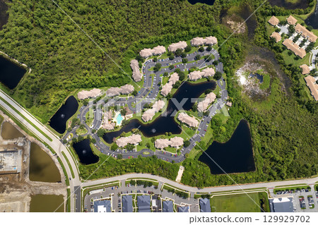 Contemporary condominiums in Florida suburban area, example of American residential development and lifestyle housing 129929702