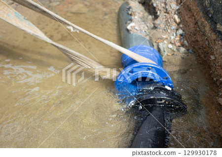 A large water leak is awaiting repair. 129930178