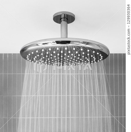 Ceiling Shower head Providing Elegant Water Flow in Bathroom Ceiling Shower head Providing Elegant Water Flow in Bathroom 129930364