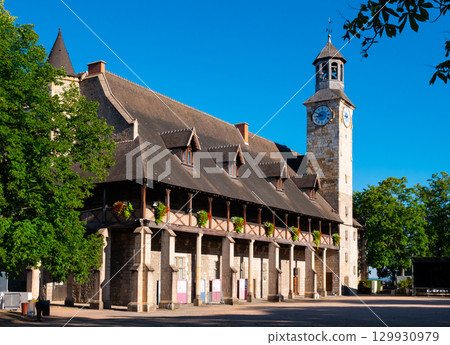 Medieval Chateau of Dukes of Bourbon decorated with flowers in Montlucon, France 129930979