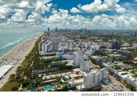 Miami Beach city with high luxury hotels and condos and sandy beachfront 129931350