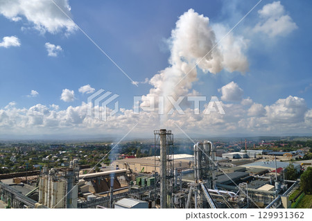 Aerial view of factory with high plant manufacture structure. Global production and manufacturing concept. 129931362