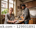 A Candid Kitchen Scene featuring a heartwarming Intimate Moment between loved ones, 129931891