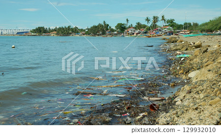 Garbage beach sea plastic waste Cebu landfill ocean pollution bottles coast water trash fishermen litter boats poor people shanty fishing nets Philippines Taytay children people fish beautiful Garbage beach sea plastic waste Cebu landfill ocean pollution bottles coast water trash fishermen litter boats poor people shanty fishing nets Philippines Taytay children people fish beautiful 129932010