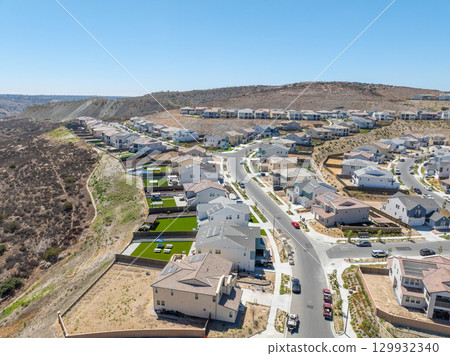 New development real estate. Aerial view of residential houses and driveways neighborhood in south San Diego, Chula Vista 129932340