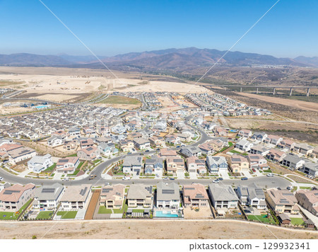 New development real estate. Aerial view of residential houses and driveways neighborhood in south San Diego, Chula Vista 129932341