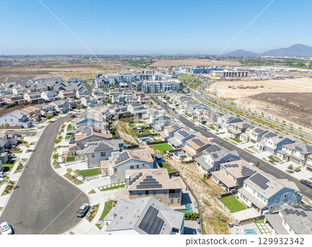 New development real estate. Aerial view of residential houses and driveways neighborhood in south San Diego, Chula Vista New development real estate. Aerial view of residential houses and driveways neighborhood in south San Diego, Chula Vista 129932342