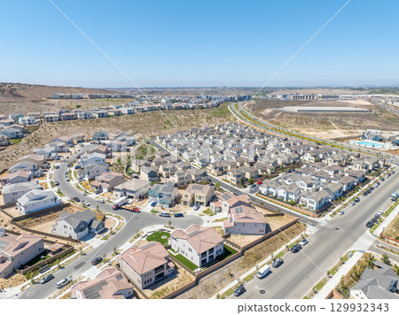 New development real estate. Aerial view of residential houses and driveways neighborhood in south San Diego, Chula Vista 129932343