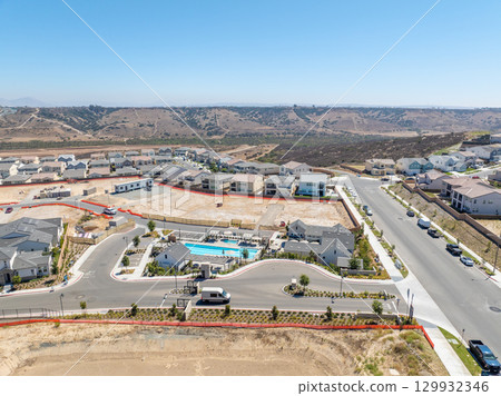 New development real estate. Aerial view of residential houses and driveways neighborhood in south San Diego, Chula Vista 129932346