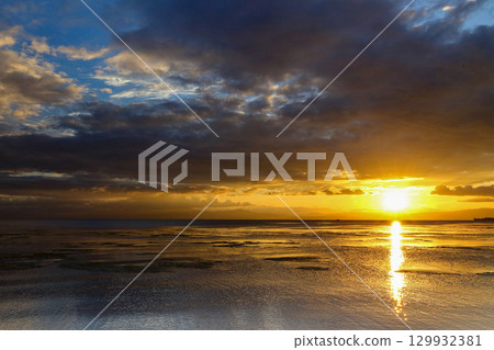 A beautiful lake where the blue sky and sunset blend together 129932381