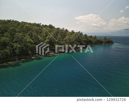 pine headland and emerald shallows along gokova bay coastline, mugla, Turkey pine headland and emerald shallows along gokova bay coastline, mugla, Turkey 129932726