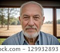 Portrait of a Smiling Senior Man in Natural Light 129932893