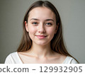 Portrait of a Young Woman with a Warm Smile 129932905