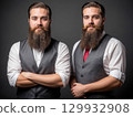 Identical Twins in Stylish Vests 129932908