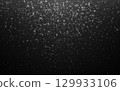 Silver glitter texture. Shiny particles on dark gradient background. Christmas shimmer effect. Magic holiday sparkles. Festive falling confetti. White sparkling dust. Vector Illustration 129933106
