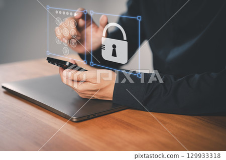 Adult man using a smartphone with a security keypad and padlock icon, symbolizing data protection, privacy, digital security, and secure mobile authentication for modern cybersecurity systems. Adult man using a smartphone with a security keypad and padlock icon, symbolizing data protection, privacy, digital security, and secure mobile authentication for modern cybersecurity systems. 129933318