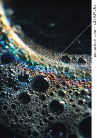 Macro Shot of Soap Bubble on Skin with Shimmering Reflections and Foamy Texture Macro Shot of Soap Bubble on Skin with Shimmering Reflections and Foamy Texture 129934568