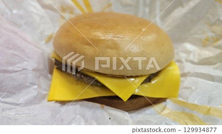 This is a double cheeseburger. 129934877