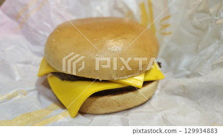 This is a double cheeseburger. 129934883