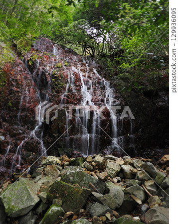 Scenery with a waterfall 129936095