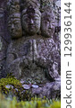 Moss-covered Buddha 129936144