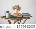 Books, bread and coffee 129938235