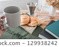 Bread and coffee on the table 129938242