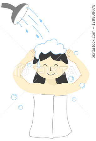 A woman is washing her hair in the bathroom 129939078