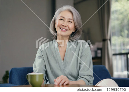 Smiling Japanese senior woman Generative AI 129939790