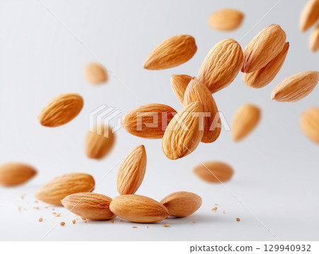 Almonds Nuts Food photography floating in the air Almonds Nuts Food photography floating in the air 129940932