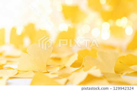 Yellow ginkgo glitter background material 129942324