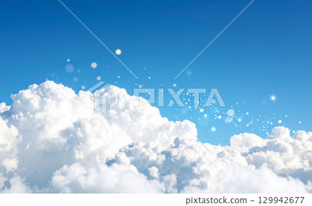 A fantastical landscape of white clouds and shining light floating in the blue sky 129942677