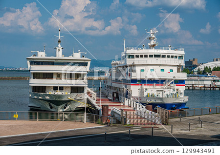 Tourist boat Bianca and learning boat Uminoko anchored at Otsu Port in Lake Biwa Tourist boat Bianca and learning boat Uminoko anchored at Otsu Port in Lake Biwa 129943491