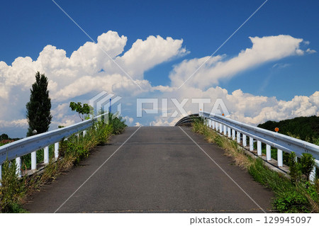 A summer afternoon with cumulus clouds A summer afternoon with cumulus clouds 129945097
